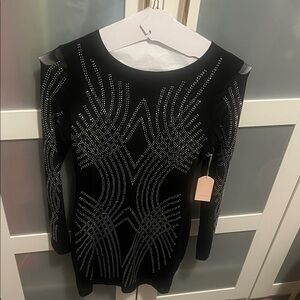 Chic Black Dress with Silver Detailing